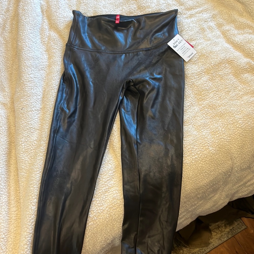 Spanx faux lather leggings tags still on. Perfect condition